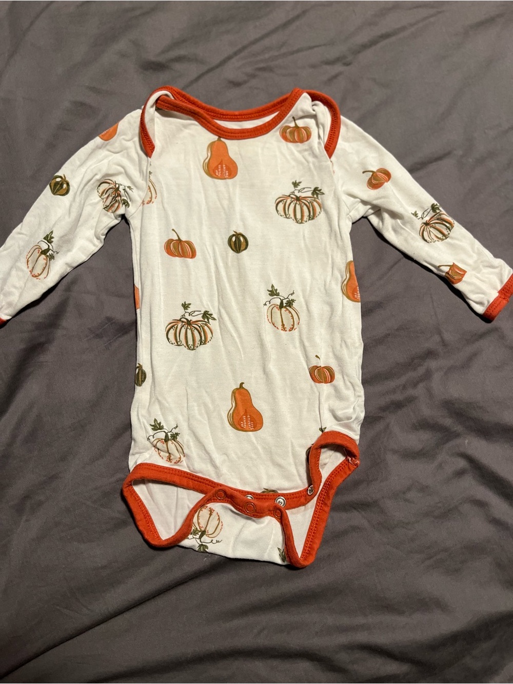 Kyte baby Pumpkin Print Long-Sleeve Baby One-Piece in White and Orange